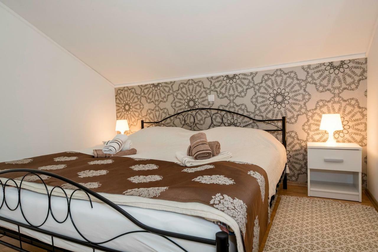 Apartmani Godinic Palit 外观 照片