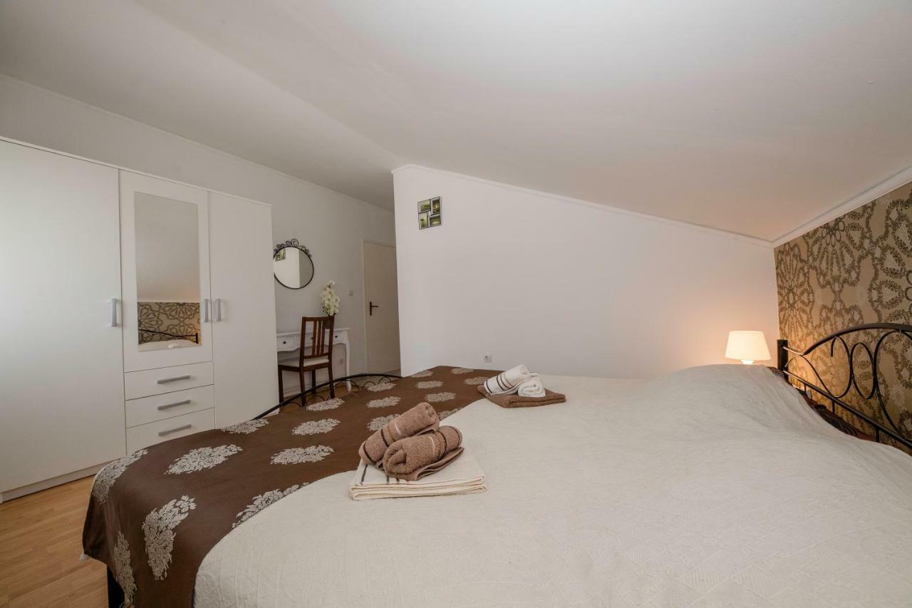 Apartmani Godinic Palit 外观 照片